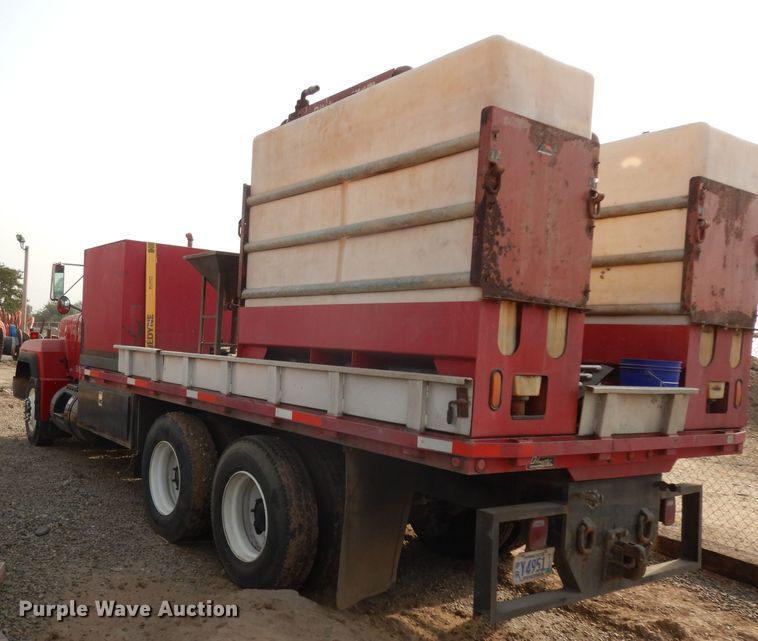 image for item DJ6505 1993 Mack RD688S  flatbed truck with fluid mixing system