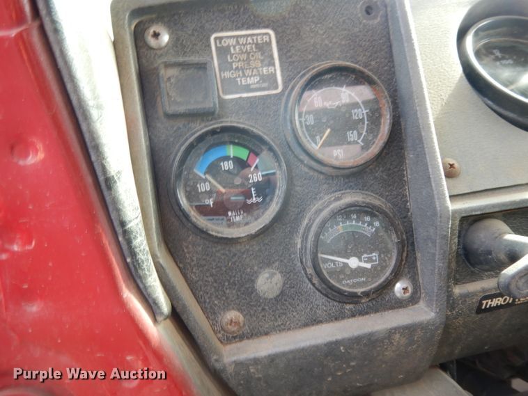 image for item DJ6505 1993 Mack RD688S  flatbed truck with fluid mixing system