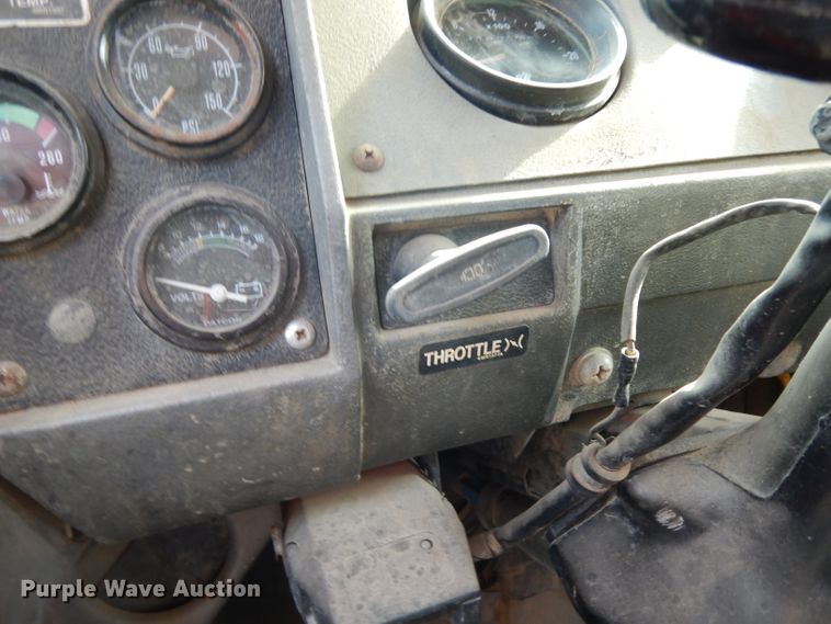 image for item DJ6505 1993 Mack RD688S  flatbed truck with fluid mixing system