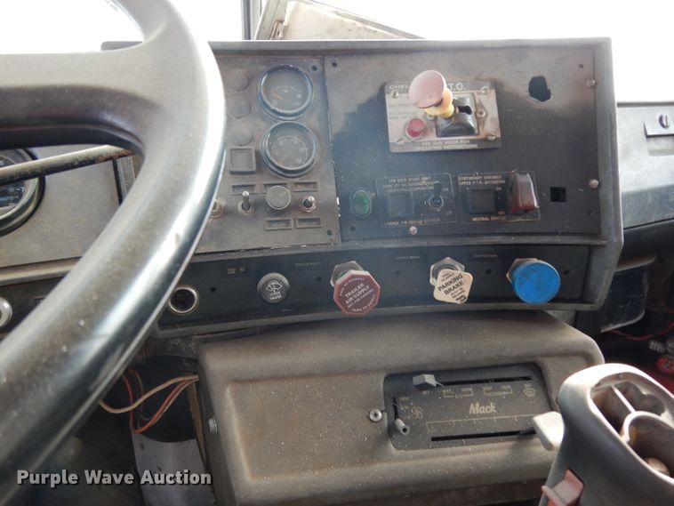 image for item DJ6505 1993 Mack RD688S  flatbed truck with fluid mixing system