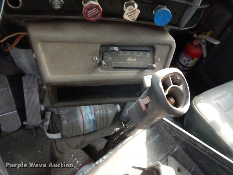 image for item DJ6505 1993 Mack RD688S  flatbed truck with fluid mixing system