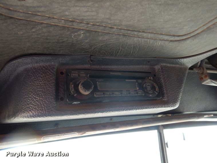 image for item DJ6505 1993 Mack RD688S  flatbed truck with fluid mixing system