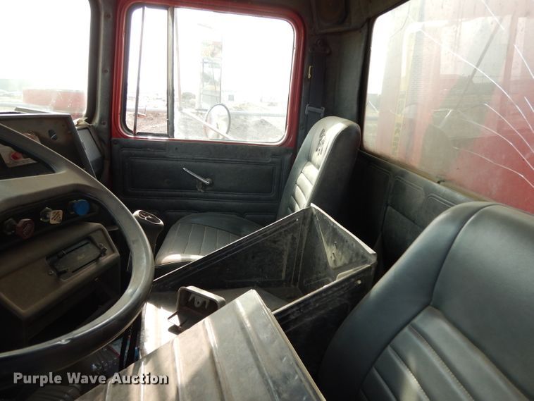 image for item DJ6505 1993 Mack RD688S  flatbed truck with fluid mixing system