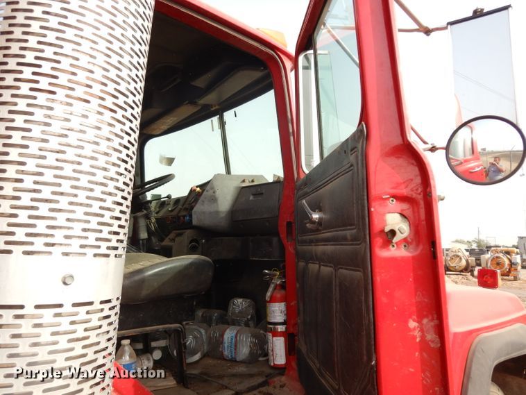 image for item DJ6505 1993 Mack RD688S  flatbed truck with fluid mixing system