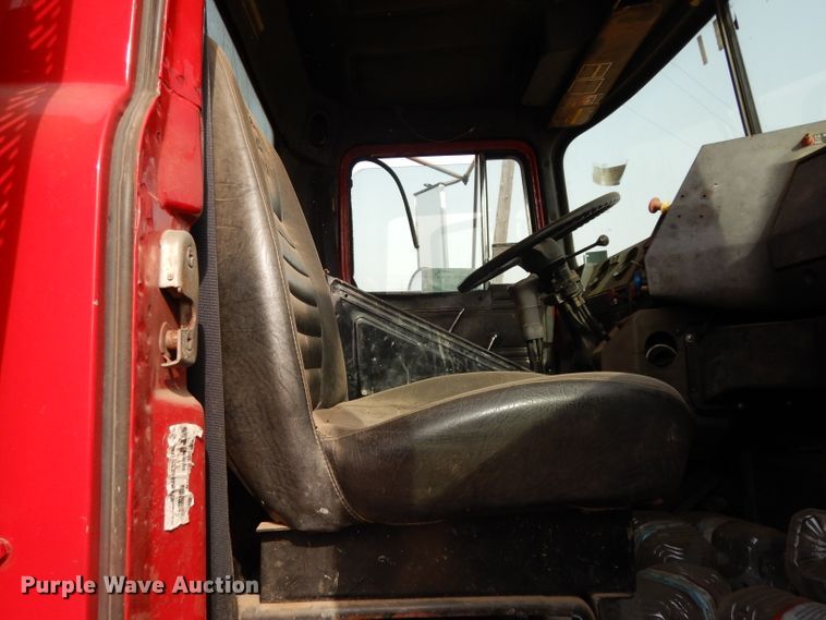 image for item DJ6505 1993 Mack RD688S  flatbed truck with fluid mixing system