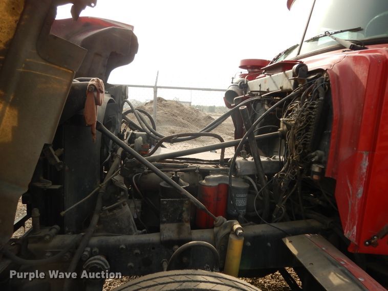 image for item DJ6505 1993 Mack RD688S  flatbed truck with fluid mixing system