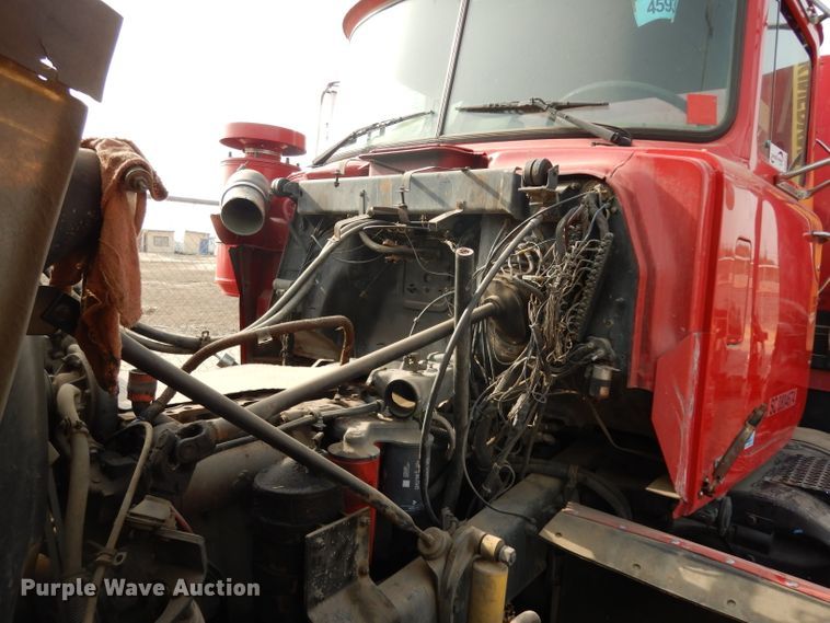 image for item DJ6505 1993 Mack RD688S  flatbed truck with fluid mixing system