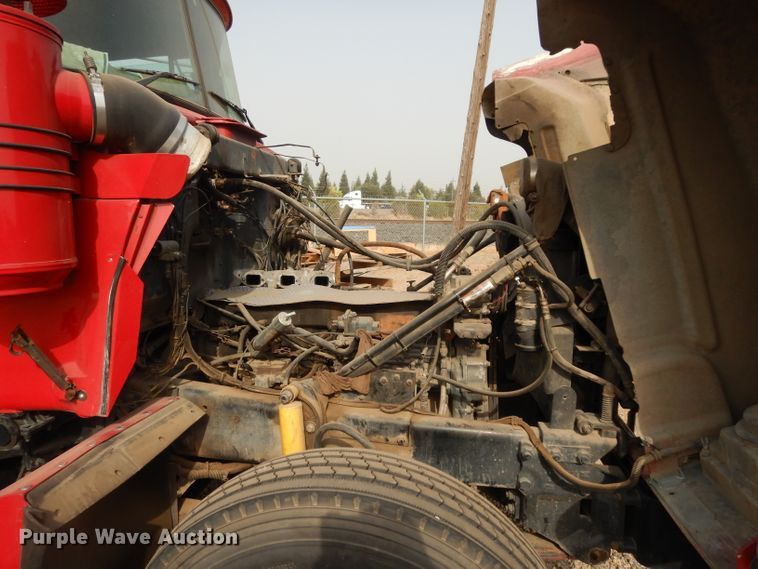 image for item DJ6505 1993 Mack RD688S  flatbed truck with fluid mixing system