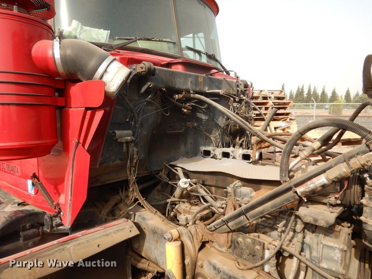 image for item DJ6505 1993 Mack RD688S  flatbed truck with fluid mixing system