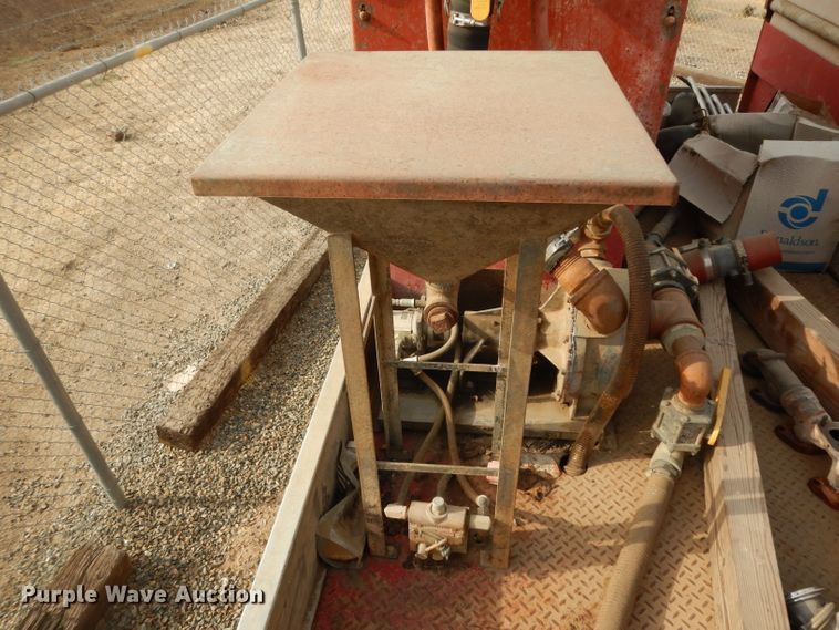 image for item DJ6505 1993 Mack RD688S  flatbed truck with fluid mixing system