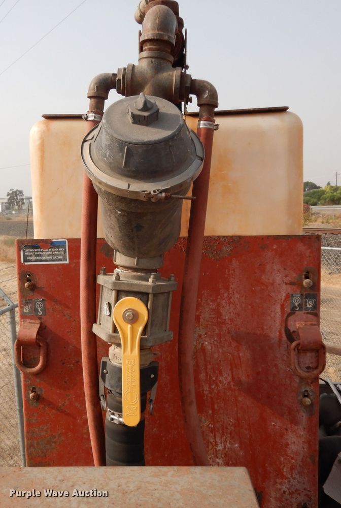 image for item DJ6505 1993 Mack RD688S  flatbed truck with fluid mixing system