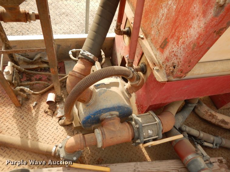 image for item DJ6505 1993 Mack RD688S  flatbed truck with fluid mixing system