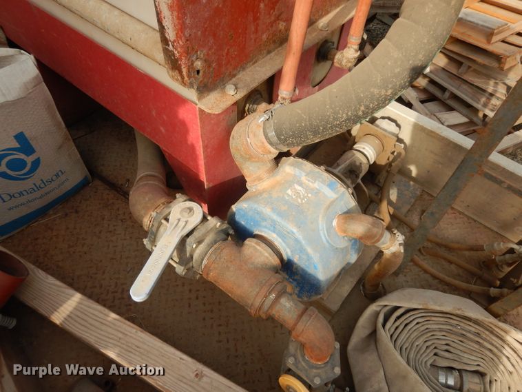 image for item DJ6505 1993 Mack RD688S  flatbed truck with fluid mixing system