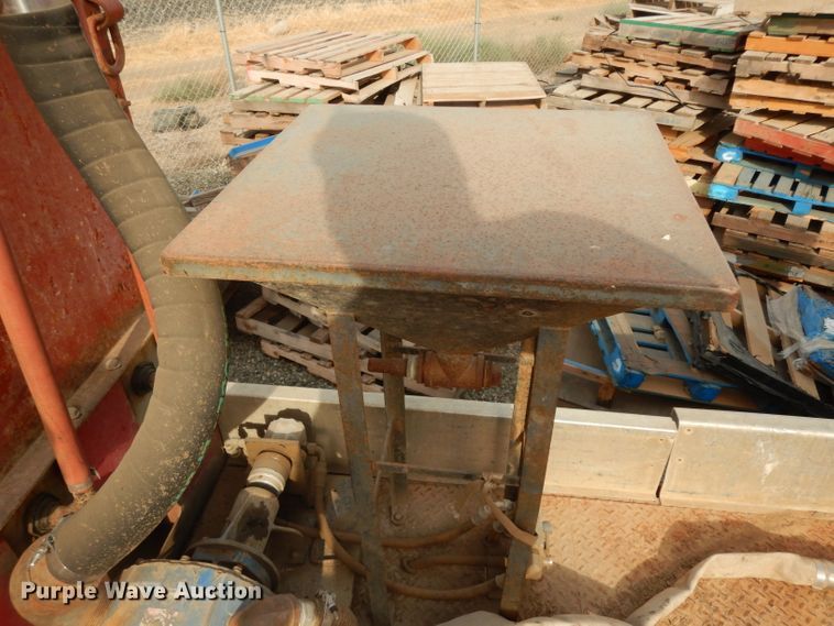 image for item DJ6505 1993 Mack RD688S  flatbed truck with fluid mixing system