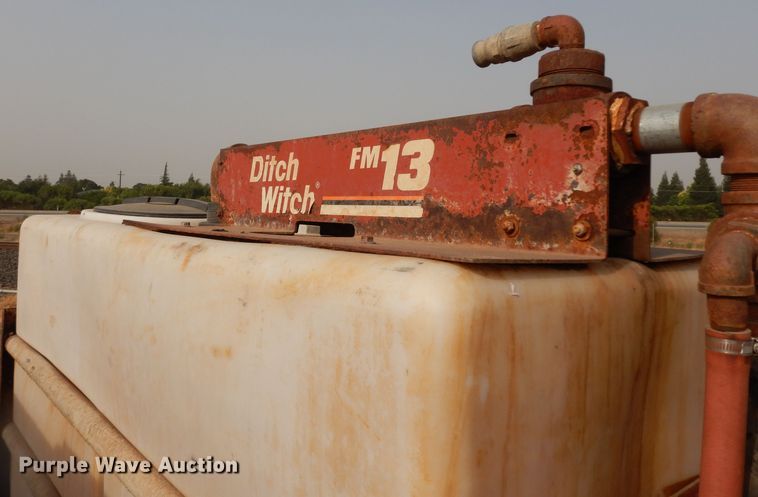 image for item DJ6505 1993 Mack RD688S  flatbed truck with fluid mixing system