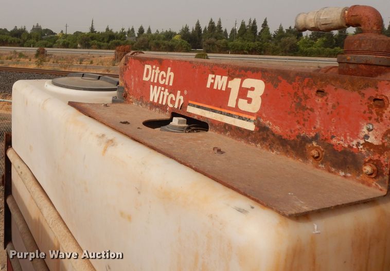 image for item DJ6505 1993 Mack RD688S  flatbed truck with fluid mixing system