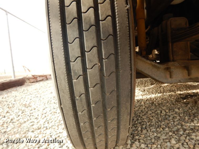 image for item DJ6505 1993 Mack RD688S  flatbed truck with fluid mixing system