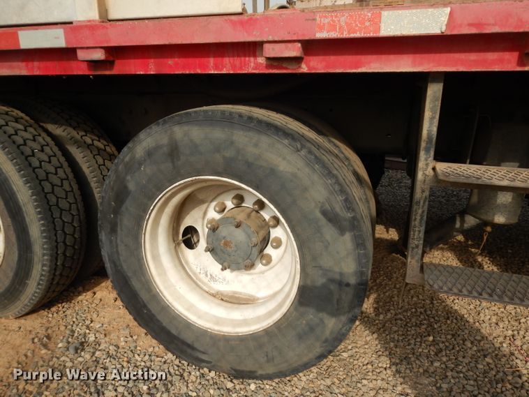 image for item DJ6505 1993 Mack RD688S  flatbed truck with fluid mixing system