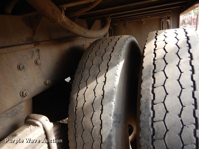 image for item DJ6505 1993 Mack RD688S  flatbed truck with fluid mixing system