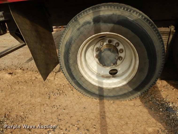 image for item DJ6505 1993 Mack RD688S  flatbed truck with fluid mixing system