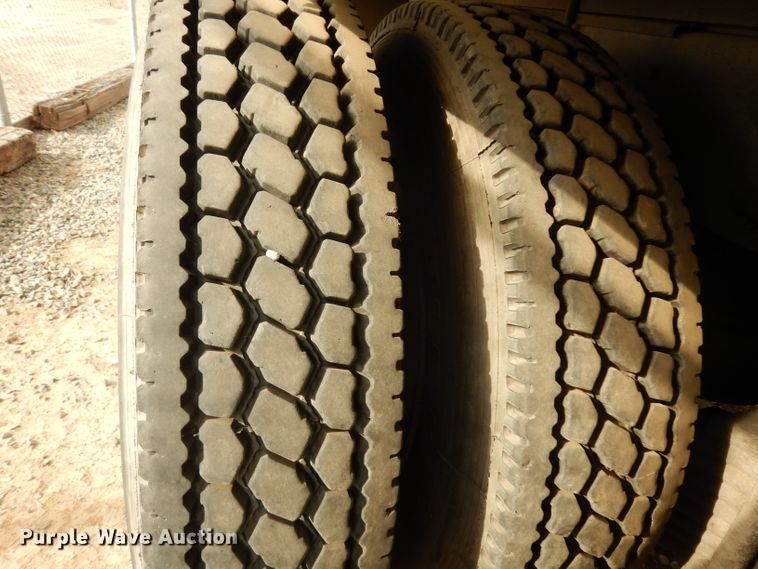 image for item DJ6505 1993 Mack RD688S  flatbed truck with fluid mixing system