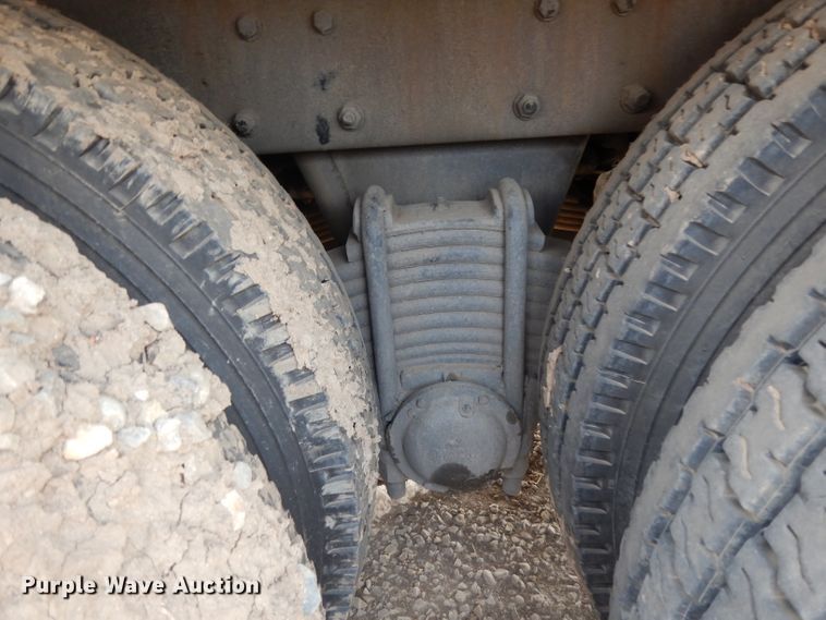 image for item DJ6505 1993 Mack RD688S  flatbed truck with fluid mixing system