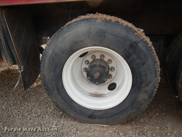 image for item DJ6505 1993 Mack RD688S  flatbed truck with fluid mixing system