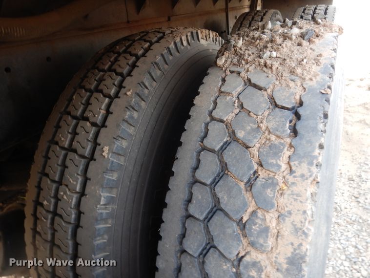 image for item DJ6505 1993 Mack RD688S  flatbed truck with fluid mixing system