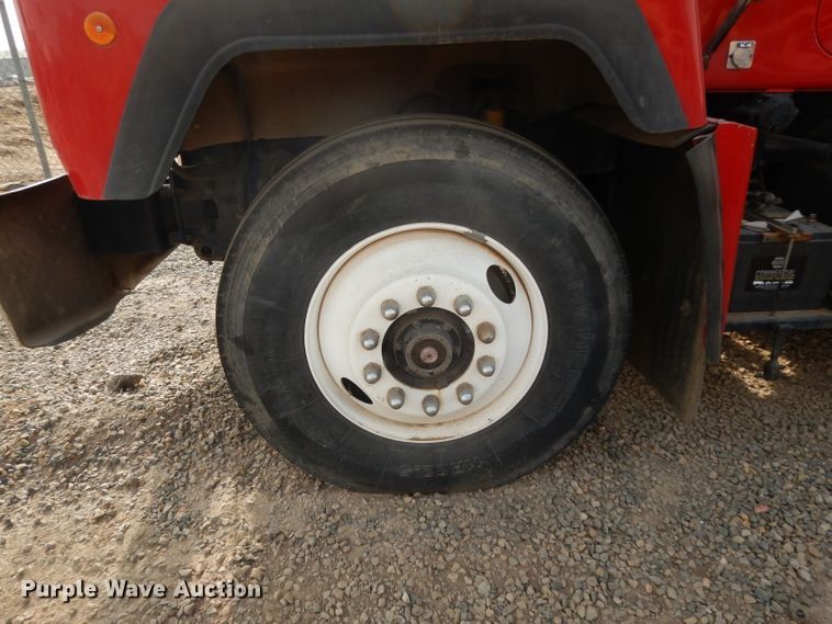 image for item DJ6505 1993 Mack RD688S  flatbed truck with fluid mixing system