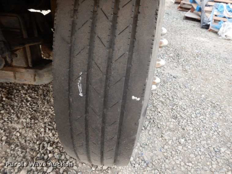 image for item DJ6505 1993 Mack RD688S  flatbed truck with fluid mixing system