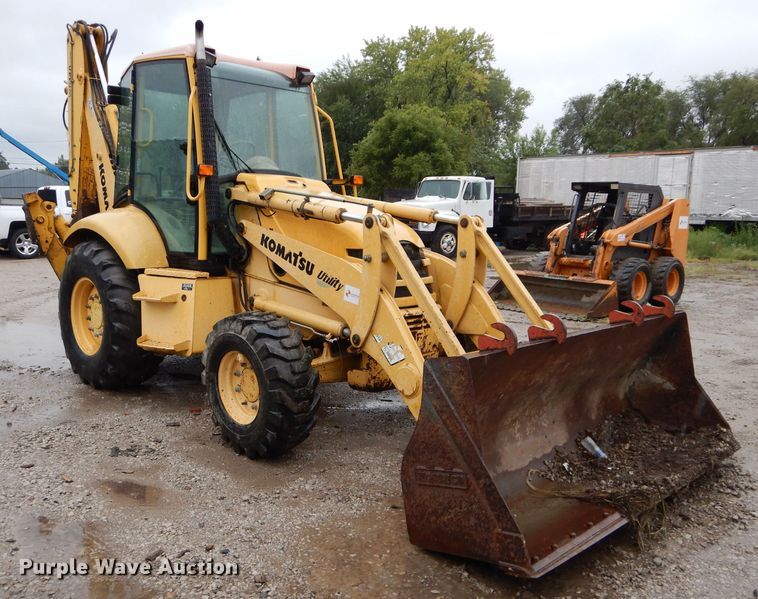 image for item DI8273 2000 Komatsu WB140-2  backhoe