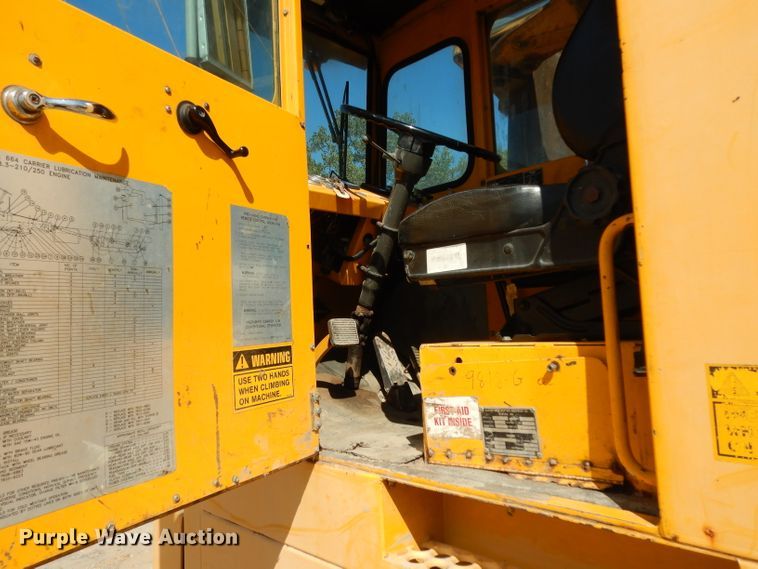 image for item DJ6541 2000 Badger 460 Hydro-Scopic  rubber tire excavator