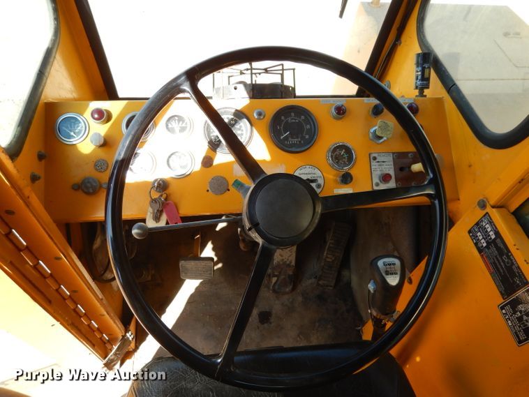 image for item DJ6541 2000 Badger 460 Hydro-Scopic  rubber tire excavator