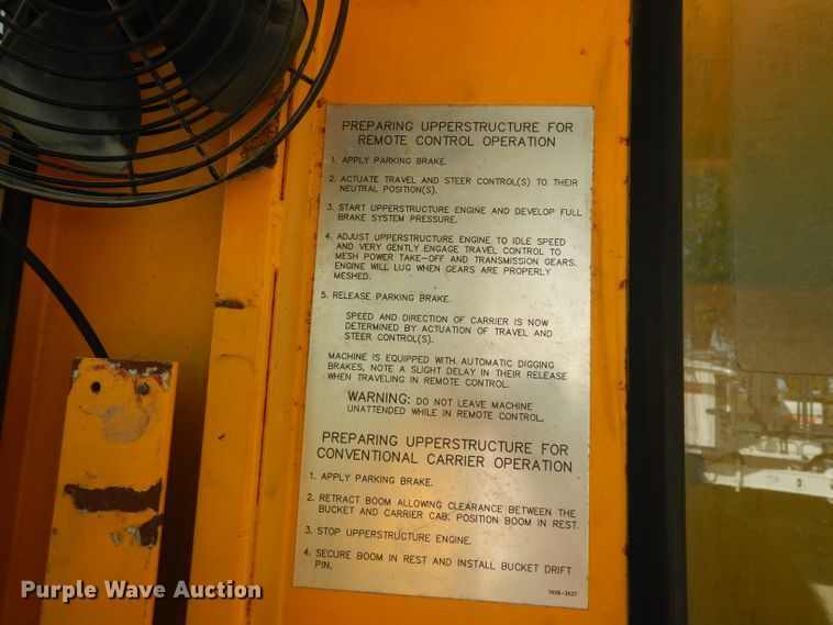 image for item DJ6541 2000 Badger 460 Hydro-Scopic  rubber tire excavator