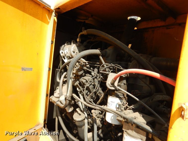 image for item DJ6541 2000 Badger 460 Hydro-Scopic  rubber tire excavator