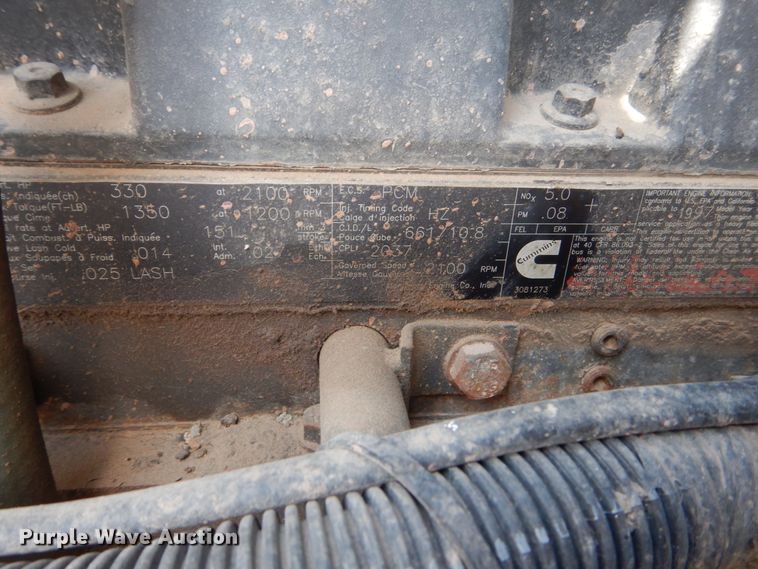 image for item FT9121 1997 Volvo WG  dump truck