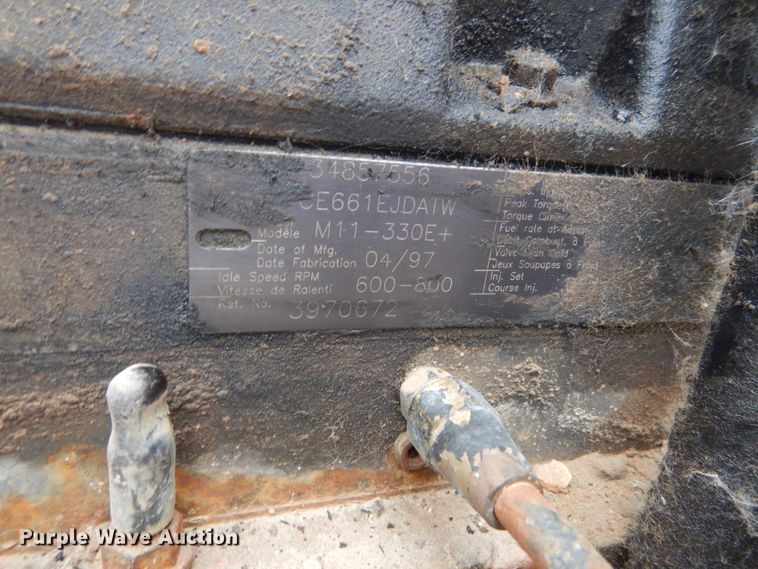 image for item FT9122 1997 Volvo WG  dump truck