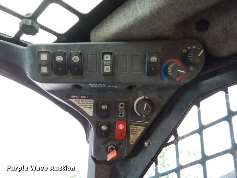 image for item HP9807 2012 John Deere 329D  tracked skid steer loader