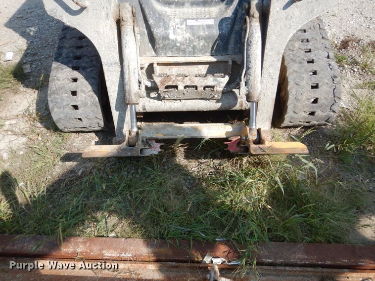 image for item HP9809 2012 John Deere 323D  tracked skid steer loader