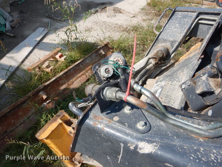 image for item HP9809 2012 John Deere 323D  tracked skid steer loader