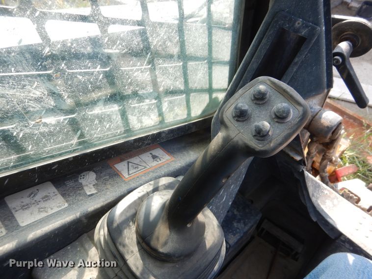 image for item HP9809 2012 John Deere 323D  tracked skid steer loader