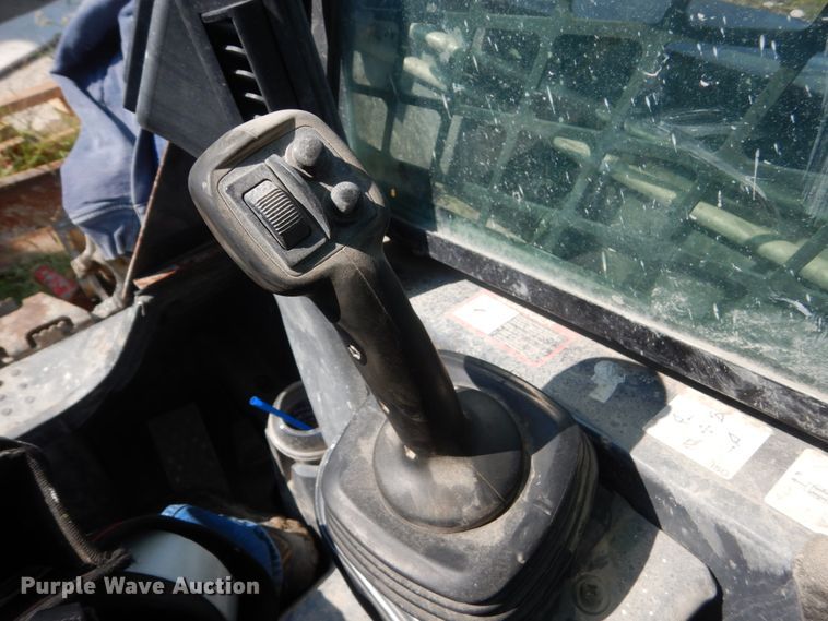 image for item HP9809 2012 John Deere 323D  tracked skid steer loader