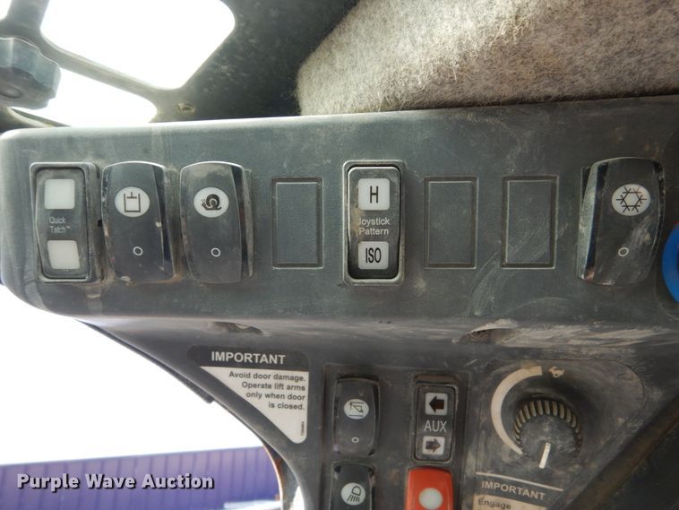 image for item HP9809 2012 John Deere 323D  tracked skid steer loader