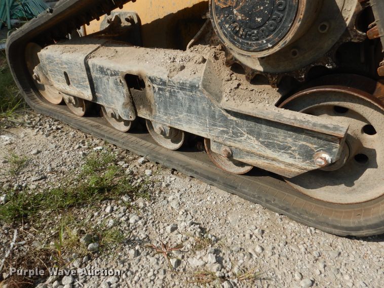 image for item HP9809 2012 John Deere 323D  tracked skid steer loader