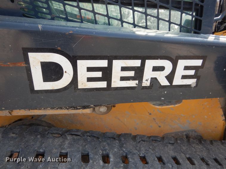 image for item HP9809 2012 John Deere 323D  tracked skid steer loader