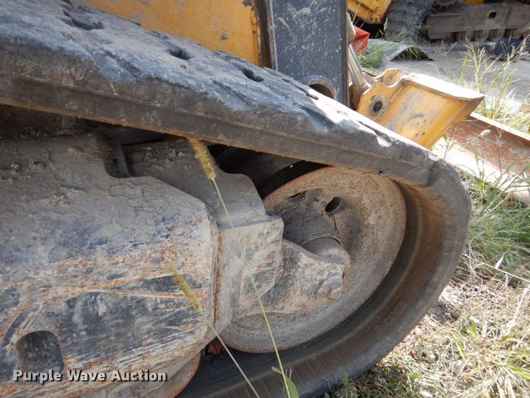 image for item HP9809 2012 John Deere 323D  tracked skid steer loader