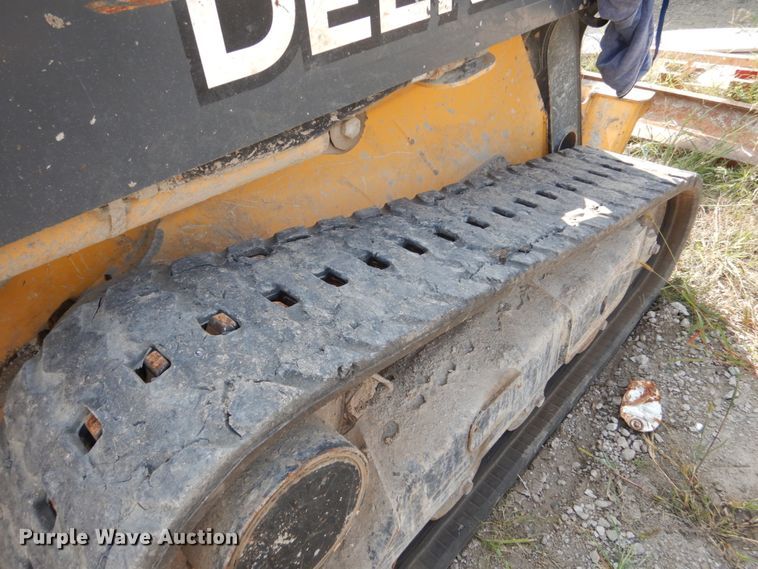 image for item HP9809 2012 John Deere 323D  tracked skid steer loader