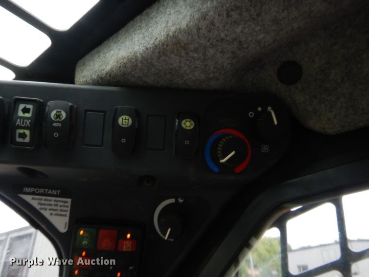 image for item HW9331 2015 John Deere 333E  tracked skid steer loader