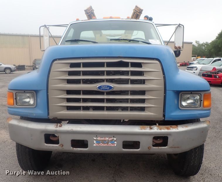 image for item DE0797 1995 Ford F800  truck with Vermeer tree spade