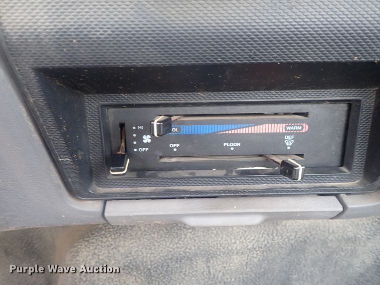 image for item DE0797 1995 Ford F800  truck with Vermeer tree spade